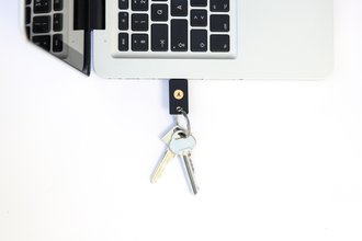 YubiKey plugged into a laptop with a Swedish keyboard layout