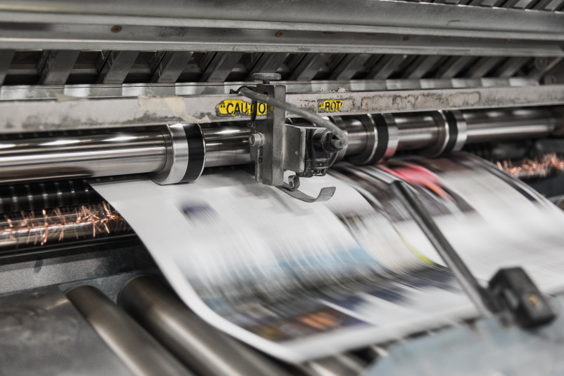 Newspaper coming off a press
