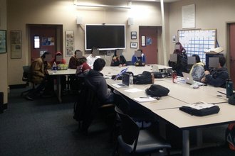 Header image showing students at a San Jose State University journalism course