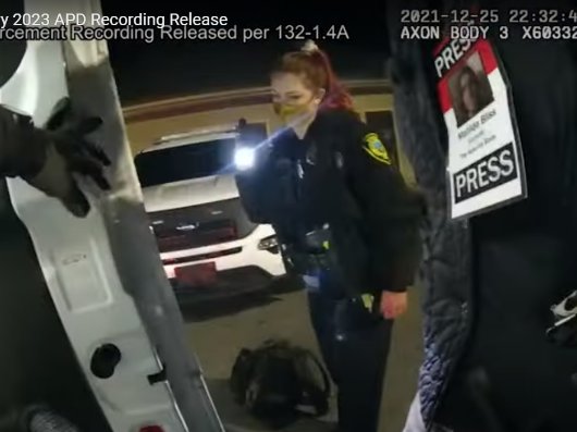 Body camera footage showing Asheville Blade journalist Matilda Bliss' press pass during their arrest