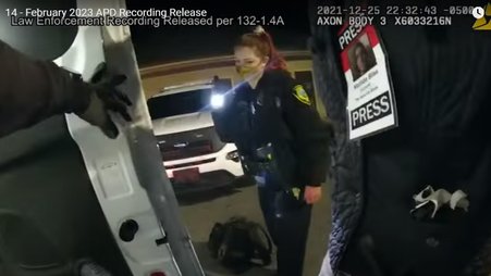 Body camera footage showing Asheville Blade journalist Matilda Bliss' press pass during their arrest