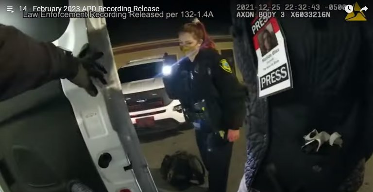 Body camera footage showing Asheville Blade journalist Matilda Bliss' press pass during their arrest