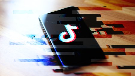 Header image of a phone with a TikTok logo