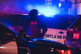 Portland police gather at a Black Lives Matter protest, 2020