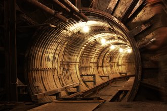Dimly lit tunnel under a Titan-1 missile silo at Toorcamp 2009
