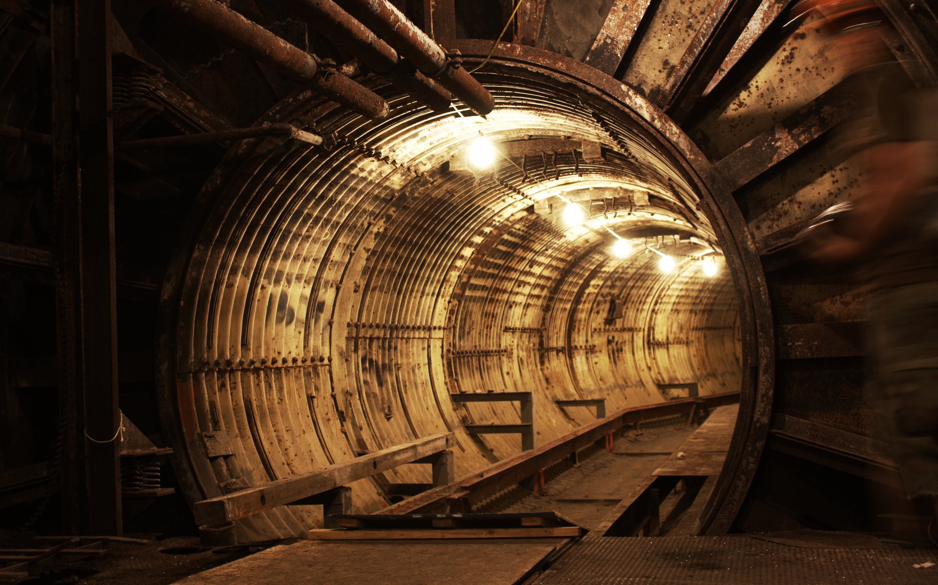 Dimly lit tunnel under a Titan-1 missile silo at Toorcamp 2009